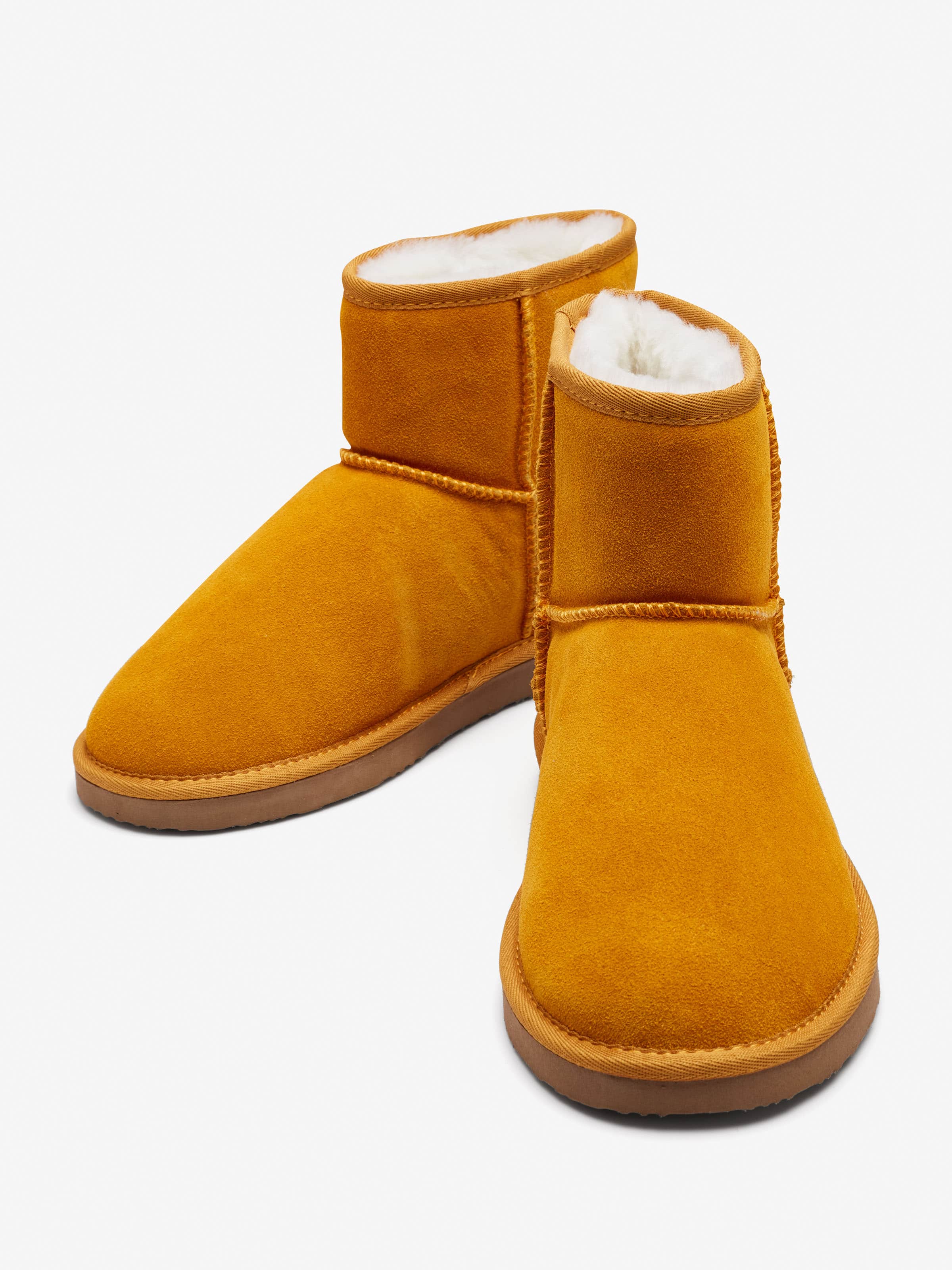 brown vans with fur inside